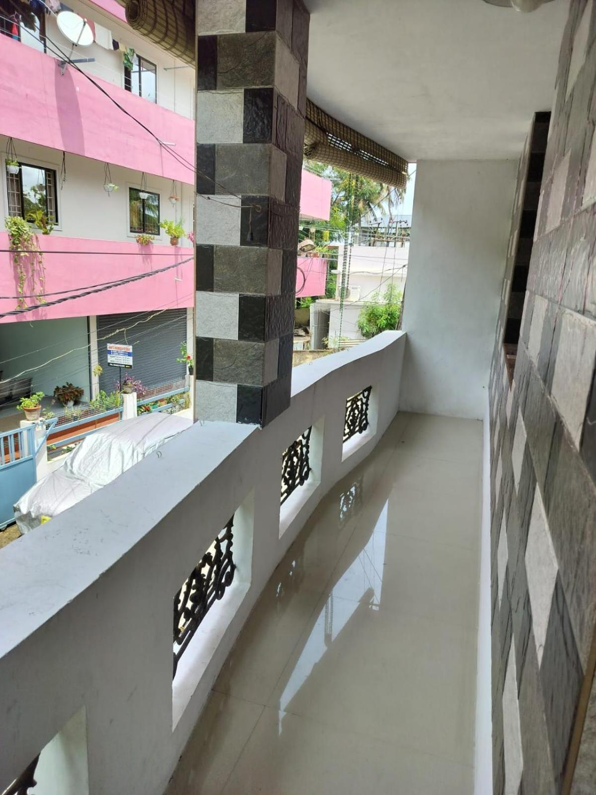 Appartement Cozy Haven à Kochi Extérieur photo