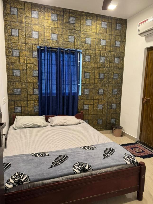 Appartement Cozy Haven à Kochi Extérieur photo